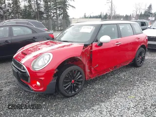 2019 MINI Clubman Cooper S with VIN WMWLU5C52K2G03545, listed as a IAAI auction lot 41279158 with 56,875 mi miles. Bid and sale history available at carsss.com. Image 2.