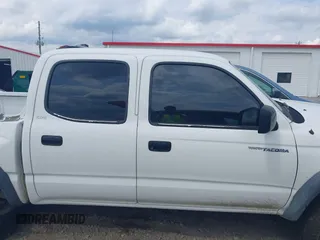 2001 Toyota Tacoma PreRunner z VIN 5TEGN92N11Z805360, wystawiony jako IAAI lot #42128006 z przebiegiem 295 381 mil mil oraz . Historia ofert i sprzedaży dostępna na DreamBid. Obrazek 13.