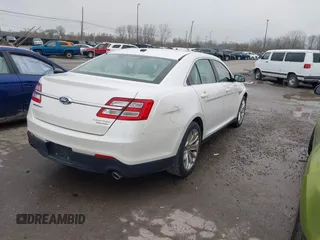 2015 Ford Taurus Limited with VIN 1FAHP2F85FG117635, listed as a IAAI auction lot 41979311 with 104,314 mi miles. Bid and sale history available at carsss.com. Image 4.