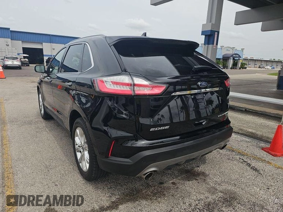 2020 Ford Edge Titanium z VIN 2FMPK3K91LBA60874, wystawiony jako IAAI lot #42470865 z przebiegiem 94 048 mil mil oraz . Historia ofert i sprzedaży dostępna na DreamBid. Obrazek 7.