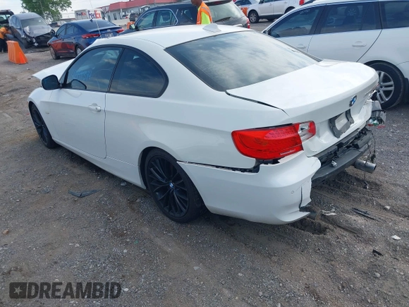 2011 BMW 3 Series 335i with VIN WBAKG7C56BE598702, listed as a IAAI auction lot 42159394 with Not provided miles and . Bid and sale history available at DreamBid. Image 3.