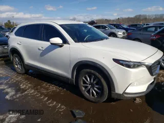 2017 Mazda CX-9 Sport with VIN JM3TCBBY1H0138961, listed as a Copart auction lot 44017305 with 81,546 mi miles and Salvage Title. Bid and sale history available at carsss.com. Image 4.