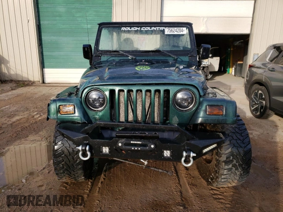 1999 Jeep Wrangler Sahara with VIN 1J4FY49S9XP431754, listed as a Copart auction lot 75624284 with 179,518 mi miles and Clean Title. Bid and sale history available at carsss.com. Image 5.