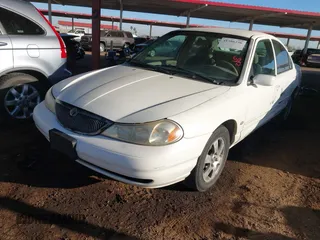1998 Mercury Mystique z VIN 1MELM6539WK602026, wystawiony jako IAAI lot #41586256 z przebiegiem 134 707 mil mil oraz . Historia ofert i sprzedaży dostępna na DreamBid. Obrazek 2.