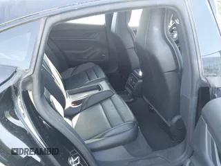 2022 Porsche Taycan z VIN WP0AA2Y10NSA11640, wystawiony jako IAAI lot #41215410 z przebiegiem 25 749 mil mil oraz . Historia ofert i sprzedaży dostępna na DreamBid. Obrazek 8.