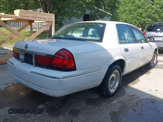 2002 Mercury Grand Marquis LS Premium with VIN 2MEFM75W82X642134, listed as a IAAI auction lot 42134033 with 252,295 mi miles and . Bid and sale history available at DreamBid. Image 4.