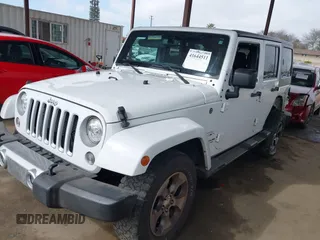 2017 Jeep Wrangler Unlimited Sahara with VIN 1C4HJWEG0HL595144, listed as a IAAI auction lot 41644511 with 143,512 mi miles. Bid and sale history available at carsss.com. Image 18.