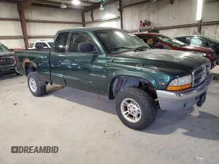 1999 Dodge Dakota SLT with VIN 1B7GG22Y9XS299933, listed as a Copart auction lot 82360644 with 146,506 mi miles and Clean Title. Bid and sale history available at DreamBid. Image 4.