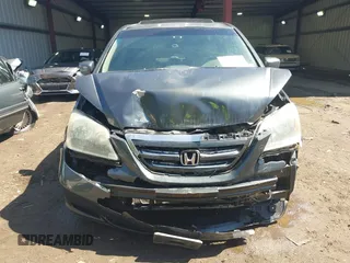 2005 Honda Odyssey EX-L with VIN 5FNRL387X5B069823, listed as a IAAI auction lot 41883007 with 267,250 mi miles and . Bid and sale history available at DreamBid. Image 12.