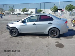 2009 Mitsubishi Lancer DE with VIN JA3AU16UX9U009351, listed as a IAAI auction lot 42139312 with 120,912 mi miles and . Bid and sale history available at carsss.com. Image 15.