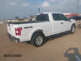 2020 Ford F-150 XL with VIN 1FTFX1E51LKF58027, listed as a IAAI auction lot 41207102 with 162,736 mi miles and . Bid and sale history available at DreamBid. Image 4.