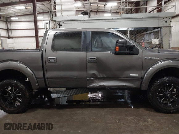 2014 Ford F-150 XL with VIN 1FTFW1ET8EFC55842, listed as a IAAI auction lot 42108858 with 190,601 mi miles. Bid and sale history available at carsss.com. Image 13.