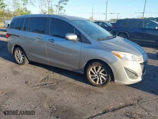 2013 Mazda Mazda5 Sport with VIN JM1CW2BL4D0147779, listed as a IAAI auction lot 41860789 with 243,068 mi miles. Bid and sale history available at carsss.com. Image 1.