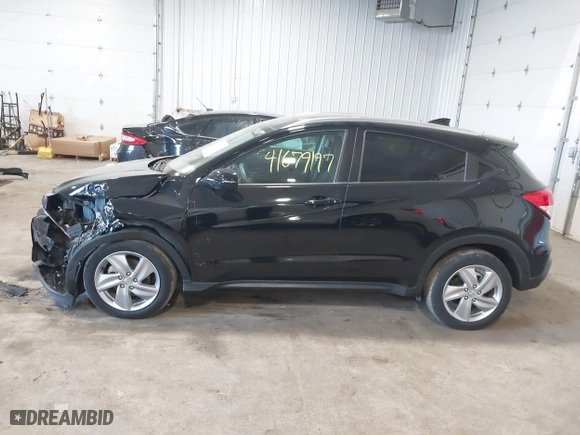 2020 Honda HR-V EX with VIN 3CZRU6H59LM737305, listed as a IAAI auction lot 41679197 with 76,670 mi miles. Bid and sale history available at carsss.com. Image 14.