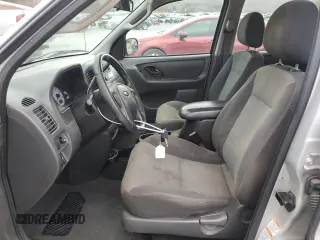 2004 Ford Escape with VIN 1FMCU02144KB63439, listed as a Copart auction lot 85310514 with 275,625 mi miles and Salvage title. Bid and sale history available at DreamBid. Image 7.