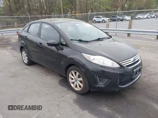 2011 Ford Fiesta SE with VIN 3FADP4BJ5BM221349, listed as a IAAI auction lot 41948737 with 216,540 mi miles. Bid and sale history available at carsss.com. Image 1.