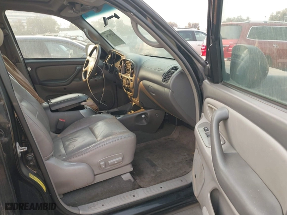2002 Toyota Sequoia Limited with VIN 5TDZT38A32S065230, listed as a IAAI auction lot 41290794 with 306,444 mi miles. Bid and sale history available at carsss.com. Image 5.