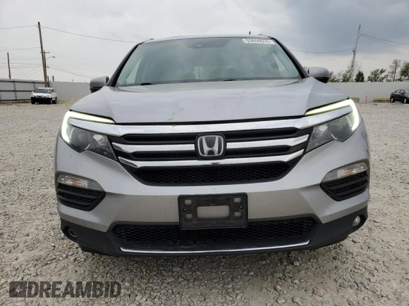 2017 Honda Pilot Touring z VIN 5FNYF6H92HB006855, wystawiony jako Copart lot #53650655 z przebiegiem 130 732 mil mil oraz Szkoda całkowita • Salvage title. Historia ofert i sprzedaży dostępna na DreamBid. Obrazek 5.