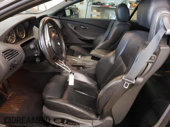 2004 BMW 6 Series 645Ci z VIN WBAEK73414B321589, wystawiony jako Copart lot #54207984 z przebiegiem 127 936 mil mil oraz Szkoda całkowita • Salvage title. Historia ofert i sprzedaży dostępna na DreamBid. Obrazek 7.