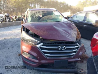 2017 Hyundai Tucson SE with VIN KM8J3CA4XHU500746, listed as a IAAI auction lot 41687679 with 69,826 mi miles. Bid and sale history available at carsss.com. Image 12.