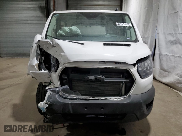 2023 Ford Transit Cargo with VIN 1FTBR1Y81PKB56612, listed as a Copart auction lot 46652685 with Not Provided miles and Salvage Title. Bid and sale history available at DreamBid. Image 5.