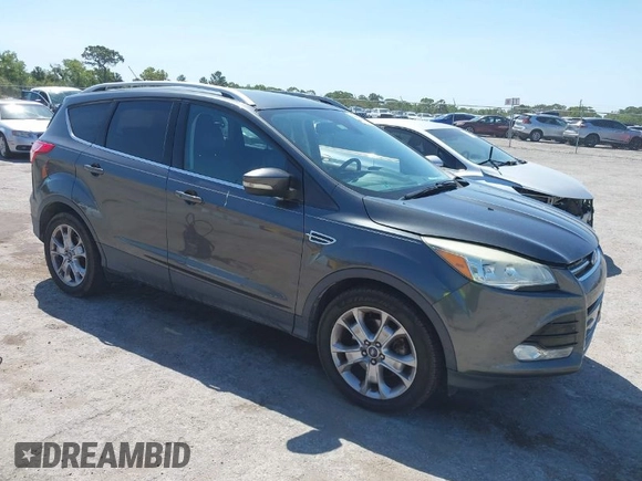 2016 Ford Escape Titanium with VIN 1FMCU0J95GUB11995, listed as a IAAI auction lot 42065255 with 142,390 mi miles. Bid and sale history available at carsss.com. Image 1.