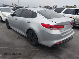 2018 Kia Optima S with VIN 5XXGT4L35JG216039, listed as a IAAI auction lot 42451216 with 91,679 mi miles and . Bid and sale history available at DreamBid. Image 3.