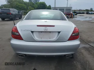 2009 Mercedes-Benz SLK 280 with VIN WDBWK54F89F192082, listed as a Copart auction lot 63422345 with 51,969 mi miles and Salvage title. Bid and sale history available at DreamBid. Image 6.
