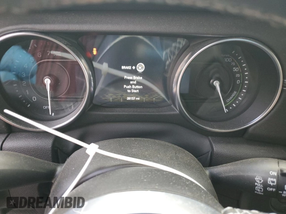 2023 Jeep Wrangler Sahara with VIN 1C4JJXP62PW553101, listed as a Copart auction lot 85543124 with 28,157 mi miles and Salvage Title. Bid and sale history available at DreamBid. Image 9.