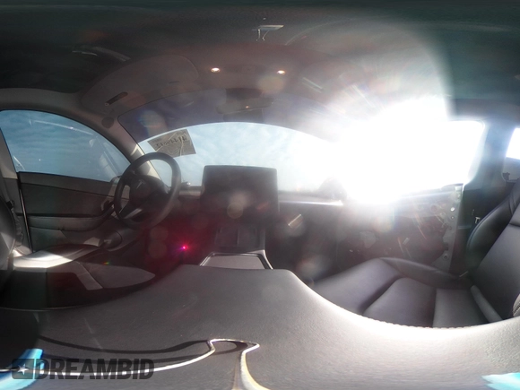 2022 Tesla Model Y Long Range z VIN 7SAYGDEE0NF435252, wystawiony jako IAAI lot #41449612 z przebiegiem 48 671 mil mil oraz . Historia ofert i sprzedaży dostępna na DreamBid. Obrazek 22.