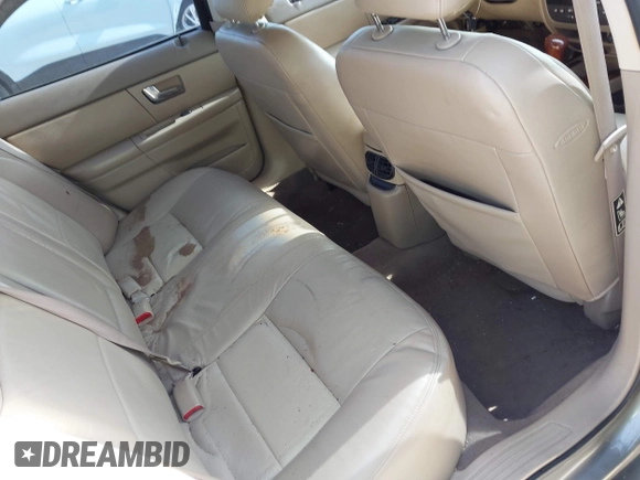 2003 Ford Taurus SEL Deluxe with VIN 1FAHP56S23G140685, listed as a IAAI auction lot 42109024 with 83,551 mi miles and . Bid and sale history available at DreamBid. Image 8.