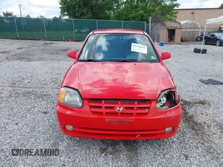 2003 Hyundai Accent GL z VIN KMHCG35CX3U247788, wystawiony jako IAAI lot #42254692 z przebiegiem 89 560 mil mil oraz . Historia ofert i sprzedaży dostępna na DreamBid. Obrazek 12.
