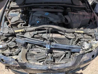 2009 BMW 3 Series 328i with VIN WBAWR33529P461100, listed as a Copart auction lot 50415115 with 57,979 mi miles and Salvage title. Bid and sale history available at DreamBid. Image 11.