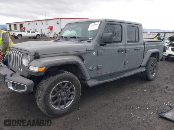2022 Jeep Gladiator High Altitude with VIN 1C6HJTFG4NL131029, listed as a IAAI auction lot 41789060 with 50,347 mi miles and . Bid and sale history available at DreamBid. Image 2.