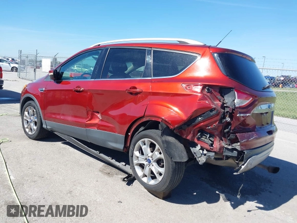 2015 Ford Escape Titanium with VIN 1FMCU9J92FUA53699, listed as a IAAI auction lot 40500310 with 197,581 mi miles. Bid and sale history available at carsss.com. Image 3.