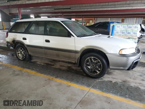 1997 Subaru Legacy Outback with VIN 4S3BG6856V6626390, listed as a Copart auction lot 54348175 with Not provided miles and Salvage title. Bid and sale history available at DreamBid. Image 4.