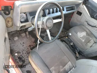 1989 Jeep Wrangler z VIN 2J4FY29T5KJ121524, wystawiony jako Copart lot #51924145 z przebiegiem Nie podano mil oraz Czysty tytuł • Clean title. Historia ofert i sprzedaży dostępna na DreamBid. Obrazek 8.