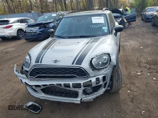 2020 MINI Countryman Cooper S z VIN WMZYX1C00L3L55740, wystawiony jako IAAI lot #42106897 z przebiegiem 92 609 mil mil oraz . Historia ofert i sprzedaży dostępna na DreamBid. Obrazek 12.