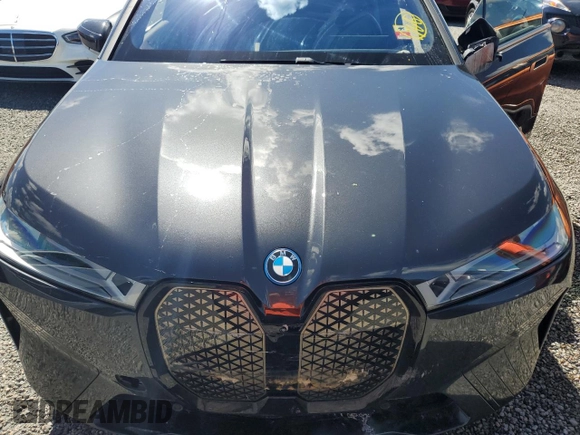 2024 BMW iX M60 z VIN WB533CF00RCN01751, wystawiony jako Copart lot #74145244 z przebiegiem 21 347 mil mil oraz Szkoda całkowita • Salvage title. Historia ofert i sprzedaży dostępna na DreamBid. Obrazek 12.