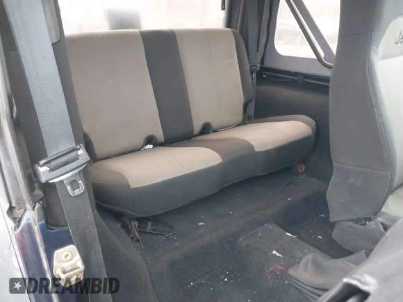 2004 Jeep Wrangler X with VIN 1J4FA39S64P780915, listed as a IAAI auction lot 42035524 with 131,057 mi miles and . Bid and sale history available at DreamBid. Image 8.