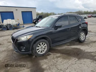 2014 Mazda CX-5 Touring with VIN JM3KE2CY8E0424757, listed as a Copart auction lot 54703195 with 111,401 mi miles and Salvage Title. Bid and sale history available at DreamBid. Image 1.