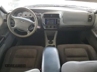 2003 Ford Explorer Sport Trac XLS с VIN 1FMZU67E83UB04700, выставлен на аукционе Copart как лот 60312155 с пробегом 220 748 миль миль и Списание • Salvage title. История ставок и продаж доступна на DreamBid. Изображение 8.