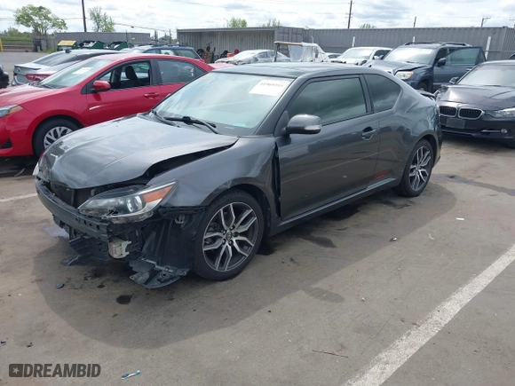 2015 Scion tC with VIN JTKJF5C73FJ008663, listed as a IAAI auction lot 41969395 with 125,758 mi miles. Bid and sale history available at carsss.com. Image 18.