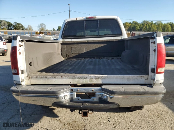 1999 Ford Super Duty F-350 SRW XL with VIN 1FTSW31F8XEB62676, listed as a Copart auction lot 75003544 with 222,029 mi miles and Salvage Title. Bid and sale history available at carsss.com. Image 6.