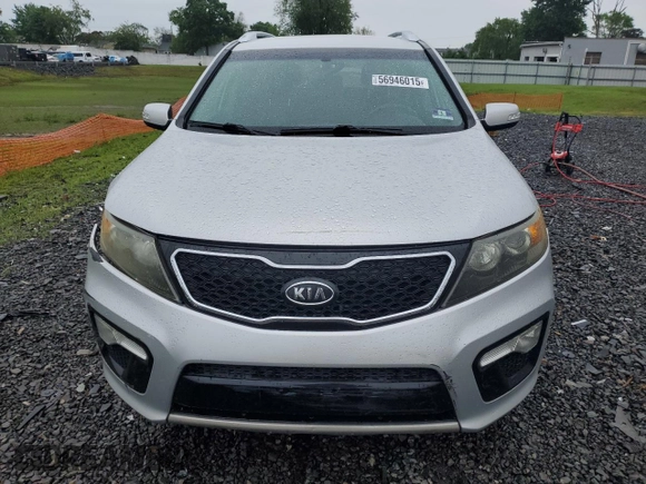 2011 Kia Sorento SX with VIN 5XYKW4A2XBG099857, listed as a Copart auction lot 56946015 with 195,457 mi miles and Salvage title. Bid and sale history available at DreamBid. Image 5.