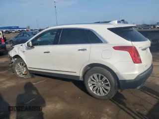 2018 Cadillac XT5 Luxury AWD with VIN 1GYKNDRS2JZ108049, listed as a Copart auction lot 55487815 with 142,632 mi miles and Salvage title. Bid and sale history available at DreamBid. Image 2.