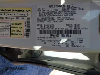 2014 Ford Fusion S with VIN 1FA6P0G71E5384783, listed as a IAAI auction lot 40868527 with 207,354 mi miles. Bid and sale history available at carsss.com. Image 9.