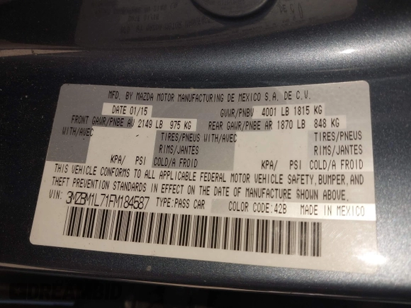 2015 Mazda 3 i Touring with VIN 3MZBM1L71FM184587, listed as a IAAI auction lot 40725367 with 137,720 mi miles and . Bid and sale history available at DreamBid. Image 9.