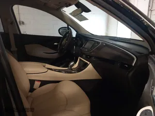 2020 Buick Envision Essence with VIN LRBFXCSA6LD182862, listed as a IAAI auction lot 41565546 with 22,672 mi miles. Bid and sale history available at carsss.com. Image 5.