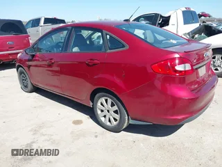 2013 Ford Fiesta SE z VIN 3FADP4BJ0DM107682, wystawiony jako IAAI lot #41772631 z przebiegiem 146 760 mil mil oraz . Historia ofert i sprzedaży dostępna na DreamBid. Obrazek 3.